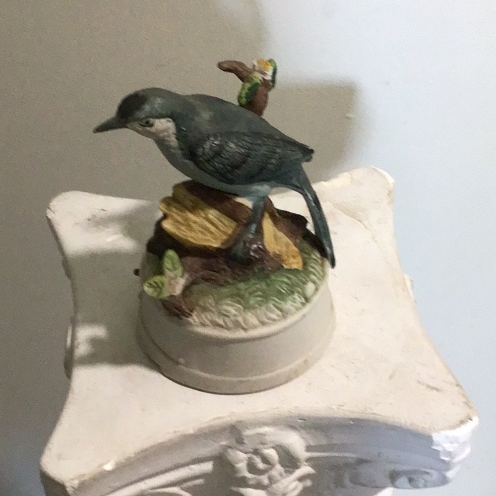 Blue and Green Bird Sculpture with Detailed Craftsmanship